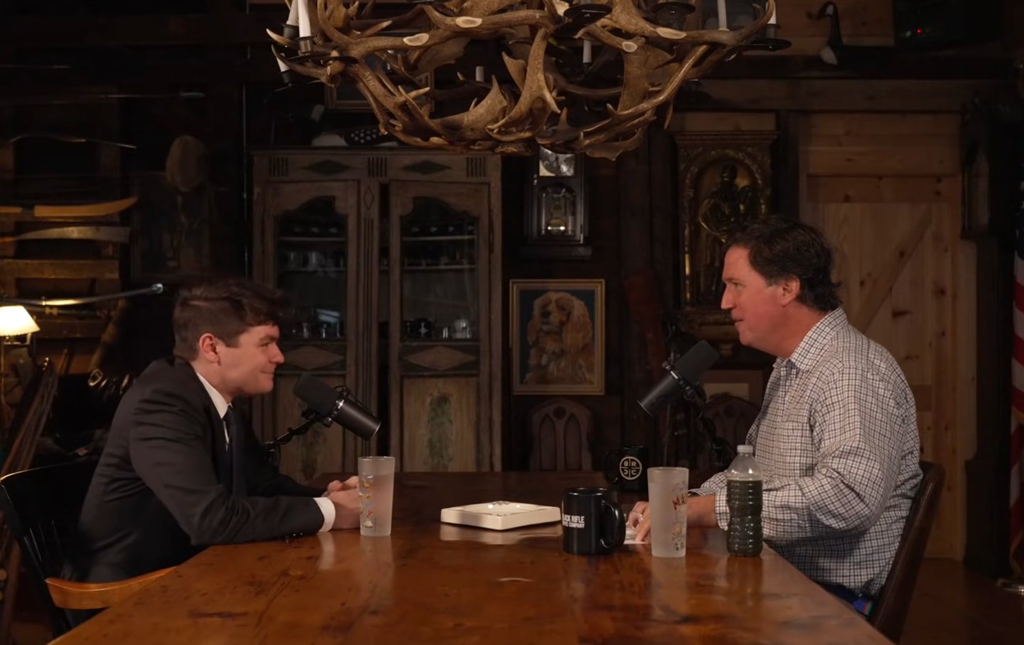 Nick Fuentes and Tucker Carlson sit down for a friendly chat.